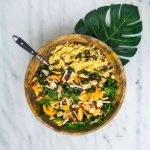 cooked rice with vegetable salad in brown wooden bowl